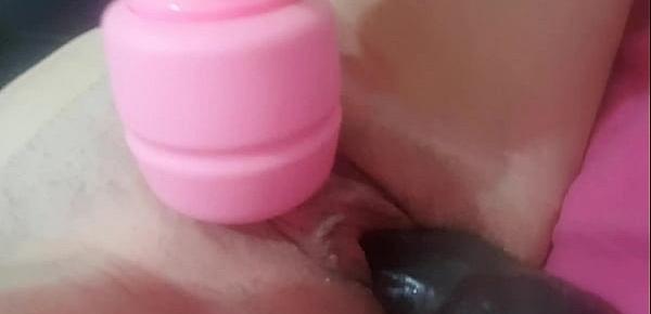  Masturbating my big pussy with a fat toy and a massager on my swollen